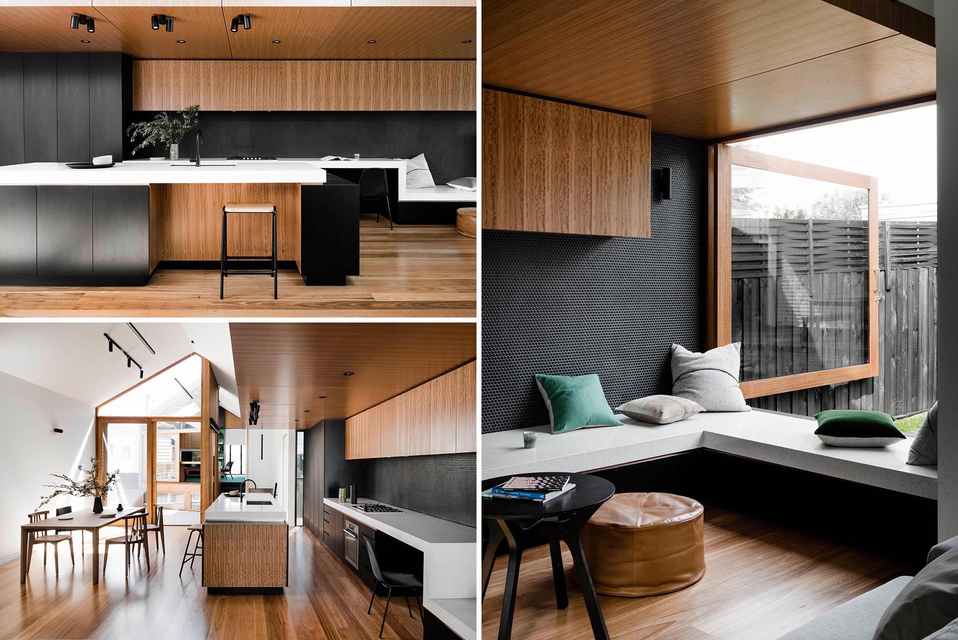 A modern kitchen with black cabinets and wood accents, has a white countertop that transforms into a desk, TV stand, and window bench.