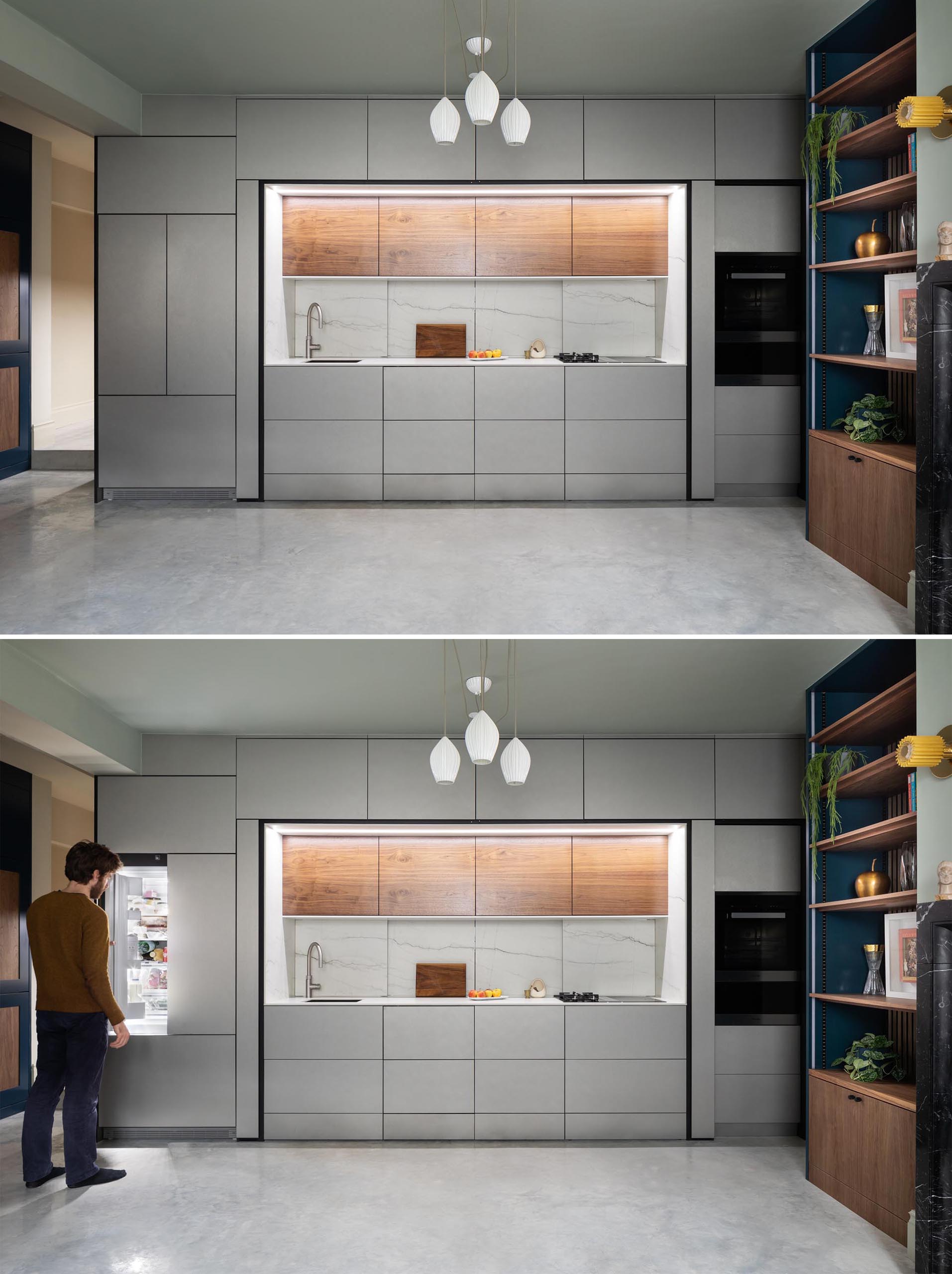 Integrated appliances have also been included, with a wall oven on the right hand side of the kitchen, while the refrigerator is on the left.