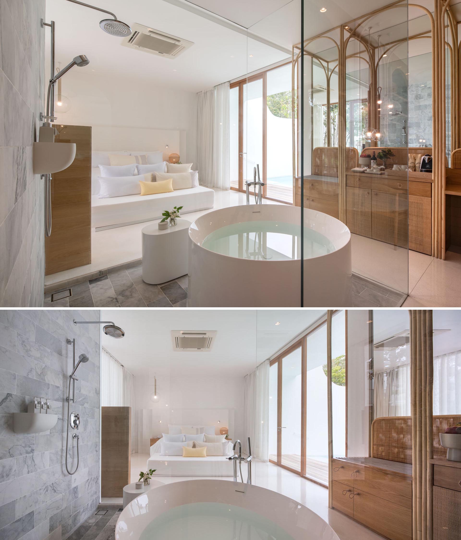 A hotel room with an open bathtub and shower.