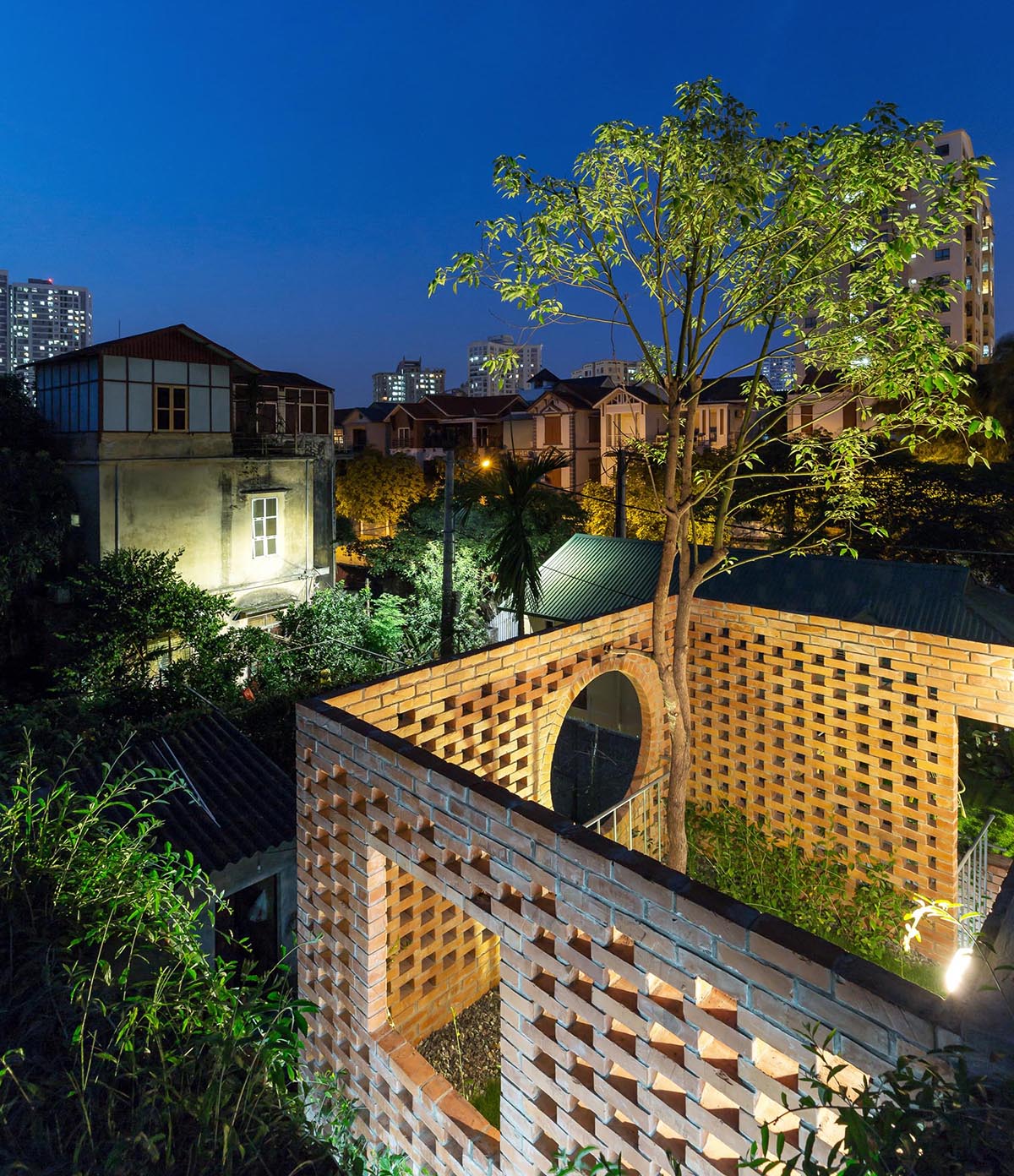 Outdoor lighting makes this rooftop terrace light up like a lantern.