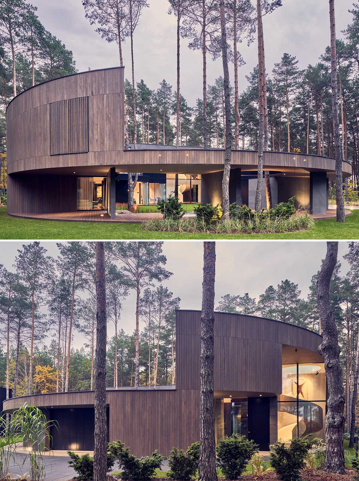 A modern round home with a wood exterior and large windows that provide a glimpse of the interior.