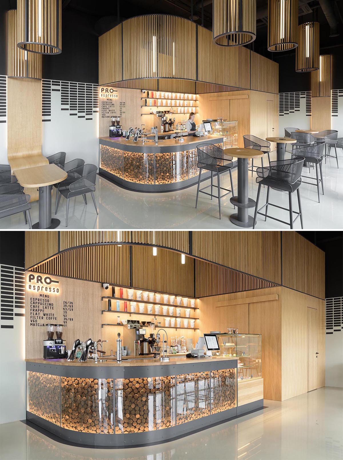 A service bar showcases the coffee machines, while the curved design complements the table designs and the column shaped lights hanging from the ceiling.