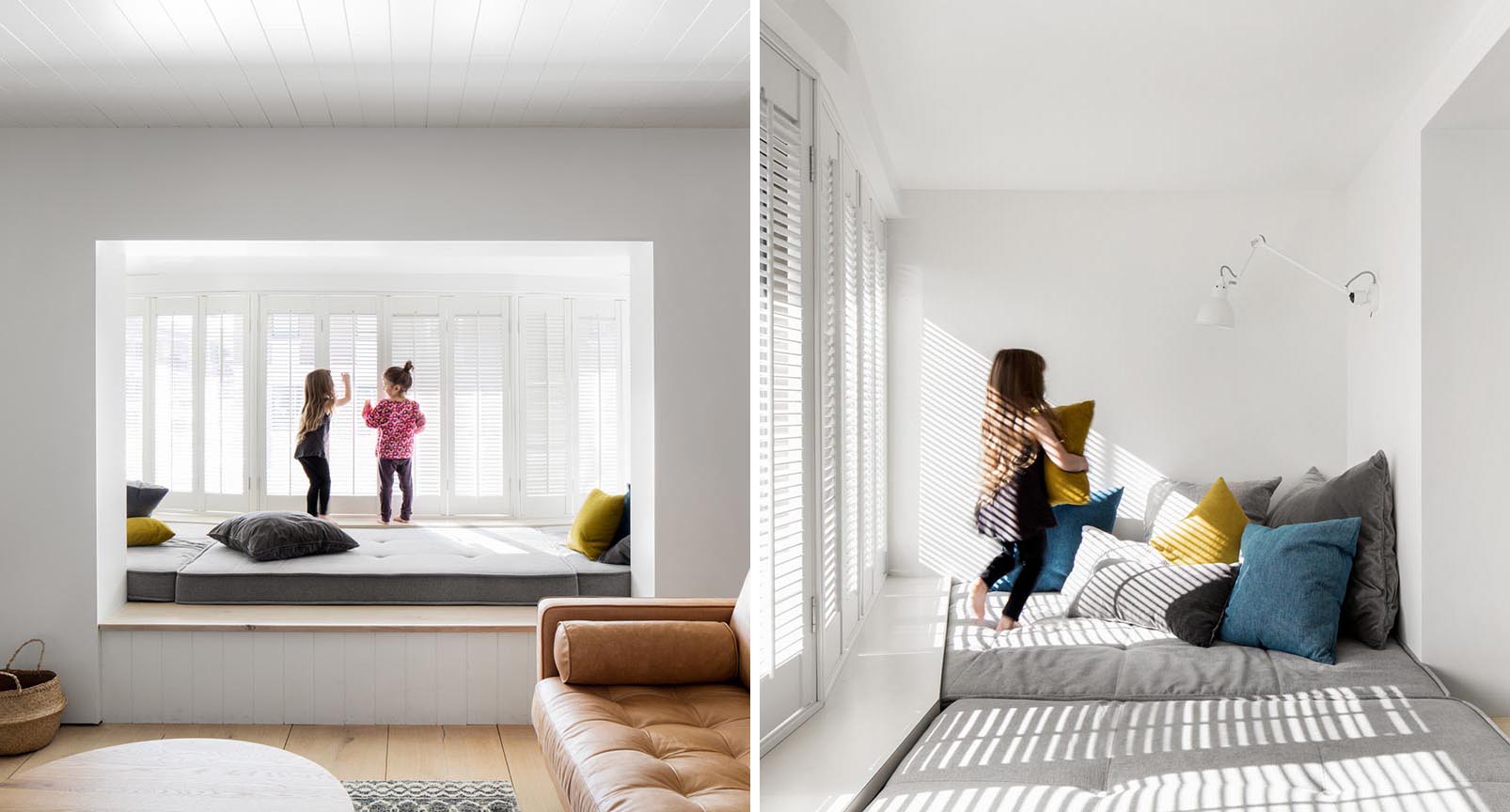 Furnished with upholstered grey cushions and colorful pillows, this custom designed day bed has natural light that filters through from the window shutters.