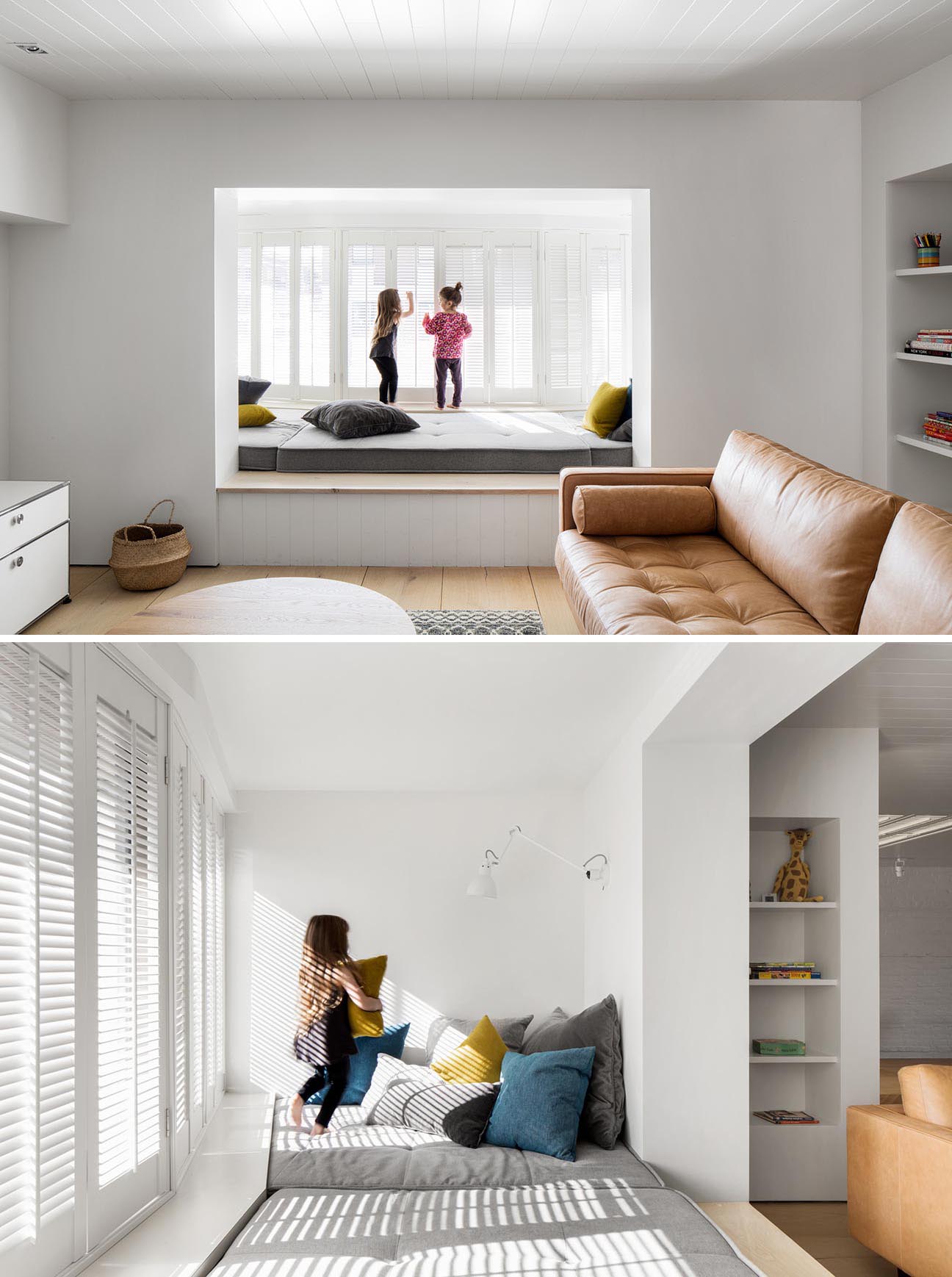 Furnished with upholstered grey cushions and colorful pillows, this custom designed day bed has natural light that filters through from the window shutters.