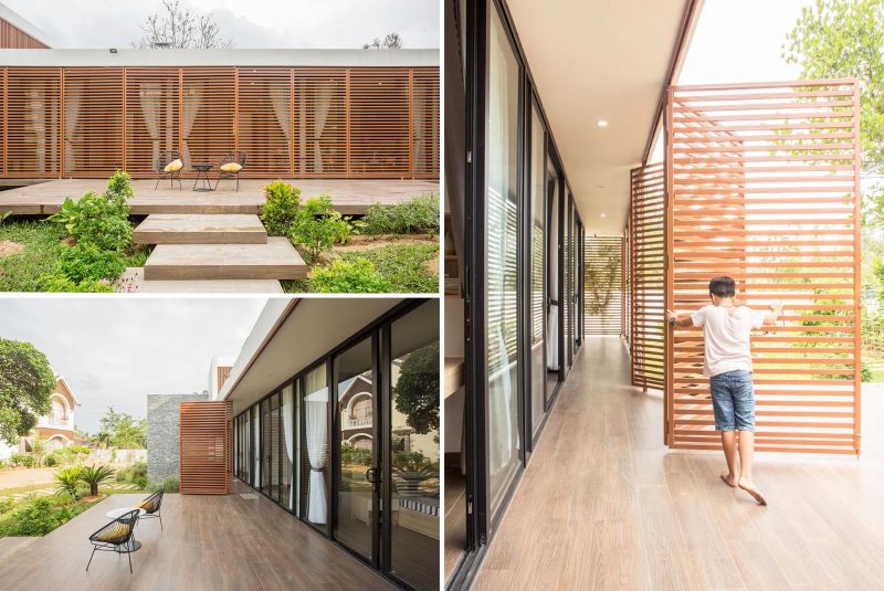 A modern house with operable metal screens that wrap around the exterior and provide an outdoor corridor.