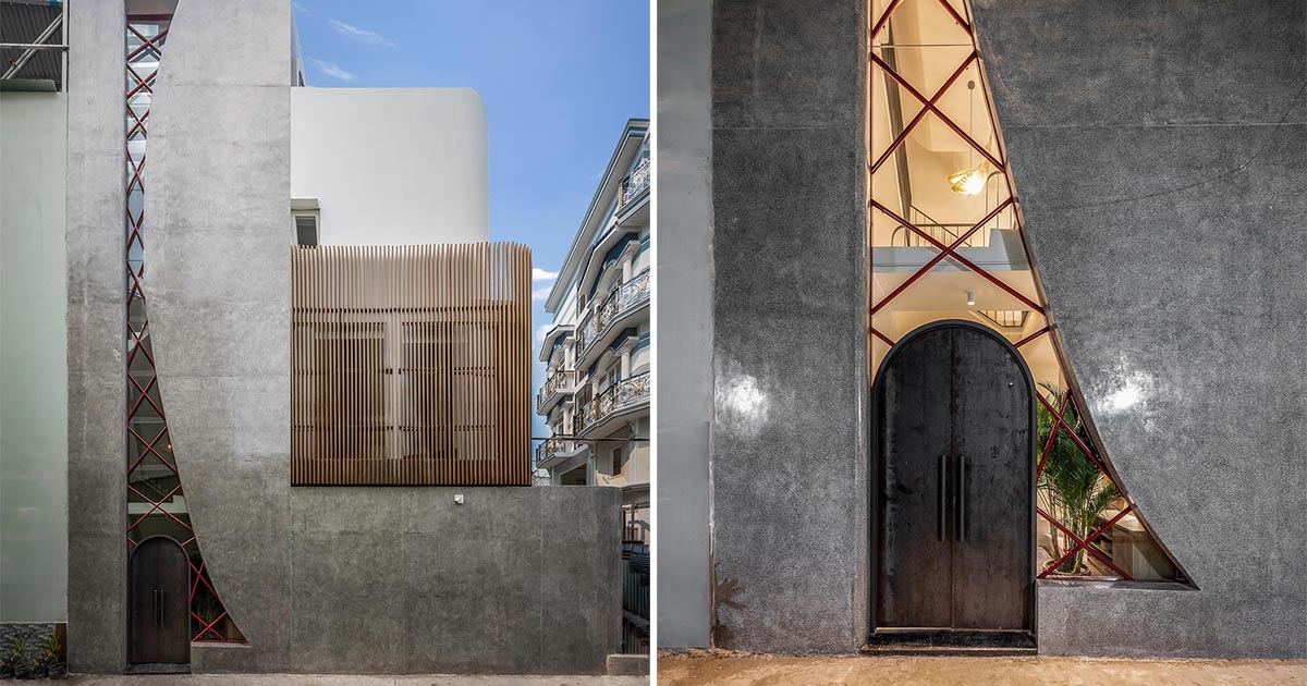 An Oversized Window That Integrates An Arched Front Door Creates A Unique Design Element For This Home