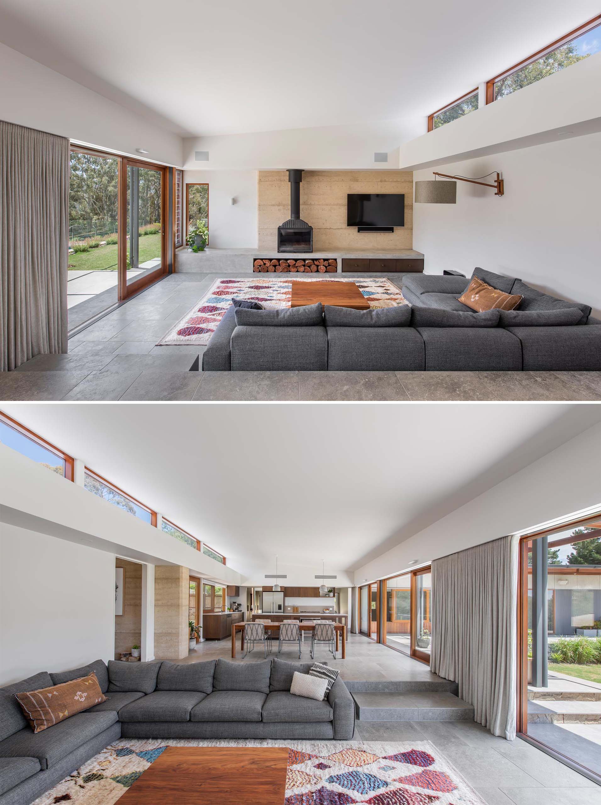 A modern interior with an open plan kitchen, dining and living area, which has an immediate relationship with the outdoor entertaining space, and can be accessed through the wood framed sliding glass doors.