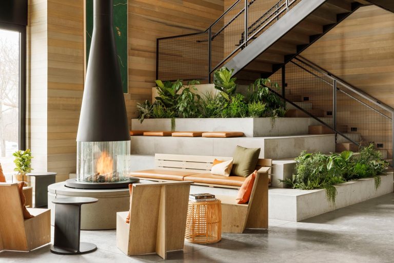 Tiered Seating With Built-In Planters Was Designed For The Base Of These Stairs