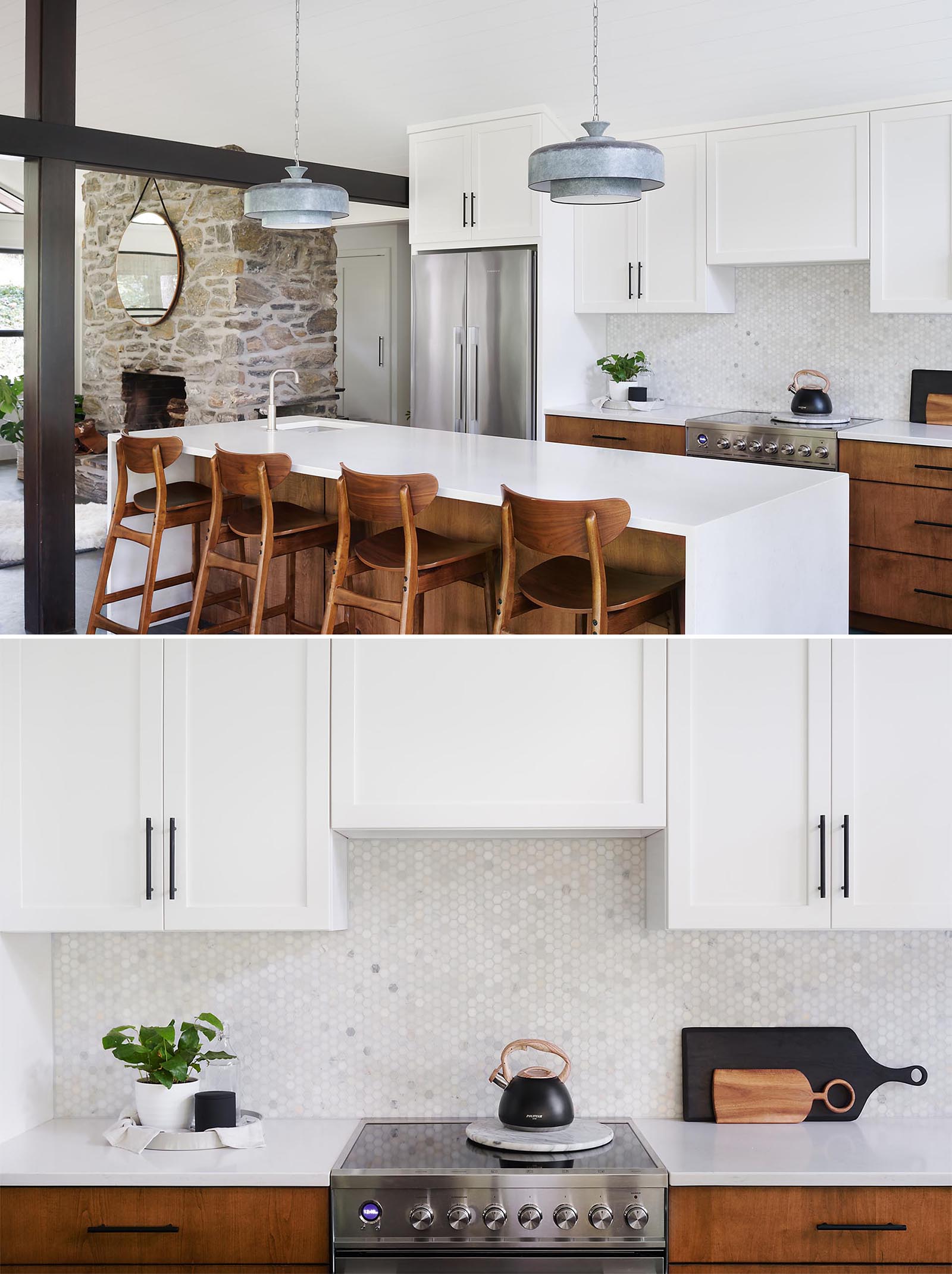 A modern kitchen with a large kitchen island provides ample countertop space, while the upper cabinets have a simple shaker style with black hardware.