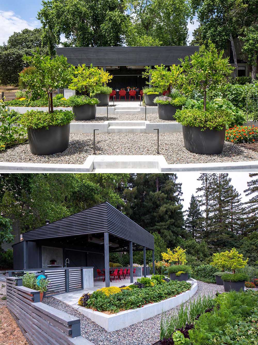 A modern garden with an covered outdoor dining area and terraced built-in planters made from concrete.