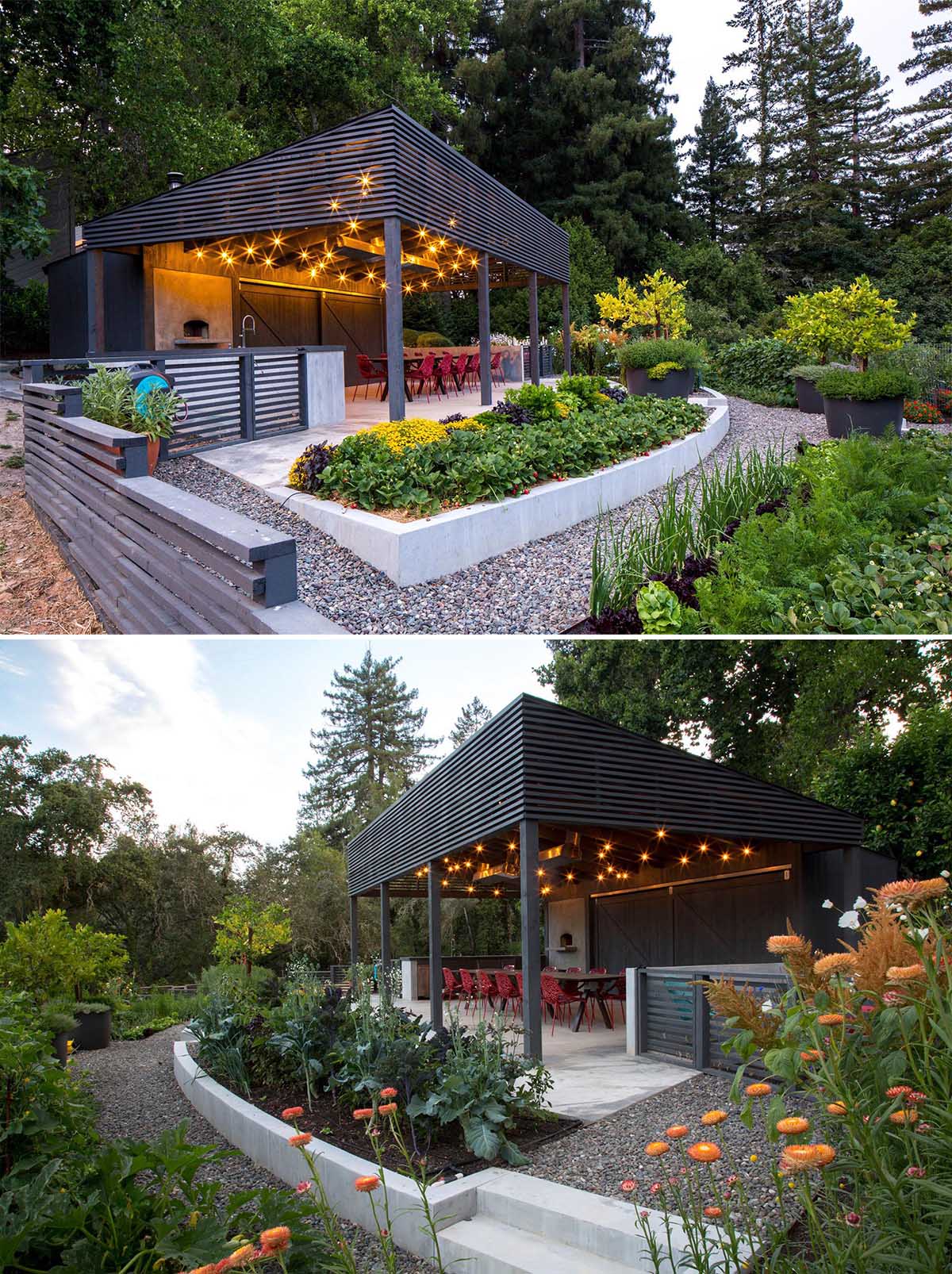 A modern garden with an covered outdoor dining area and terraced built-in planters made from concrete.
