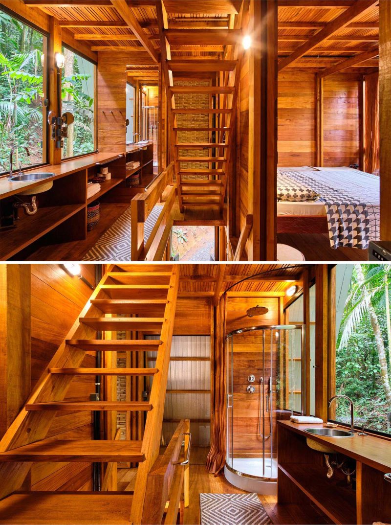 The bedroom and bathroom of an A-frame cabin with a warm wood interior.