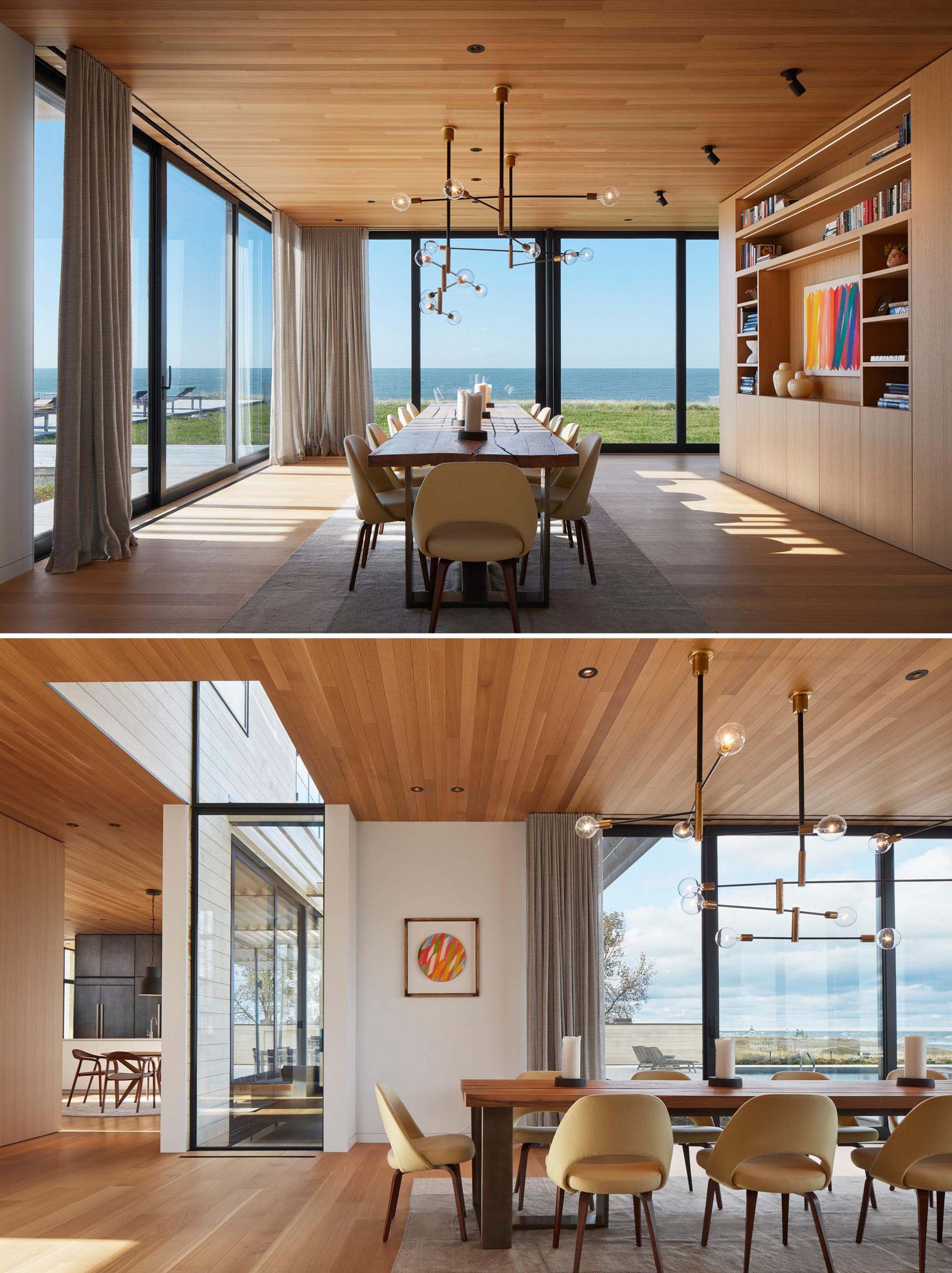 A modern living room with white oak floors and ceiling, and large windows that provide an unobstructed view of the lake.