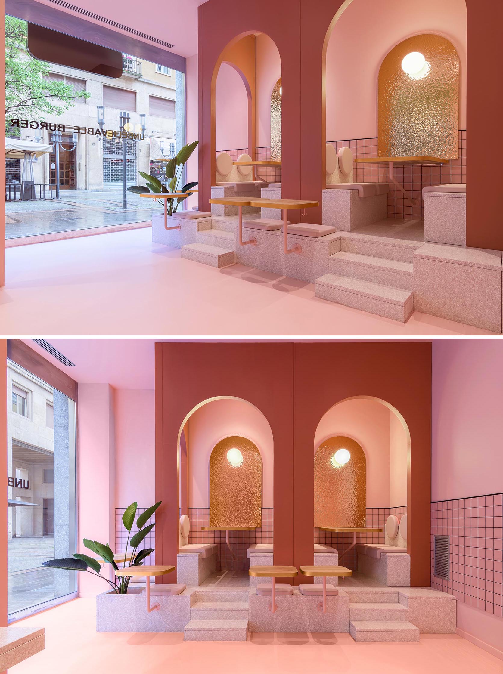 A modern restaurant interior with a pink zone that has raised seating within arches.