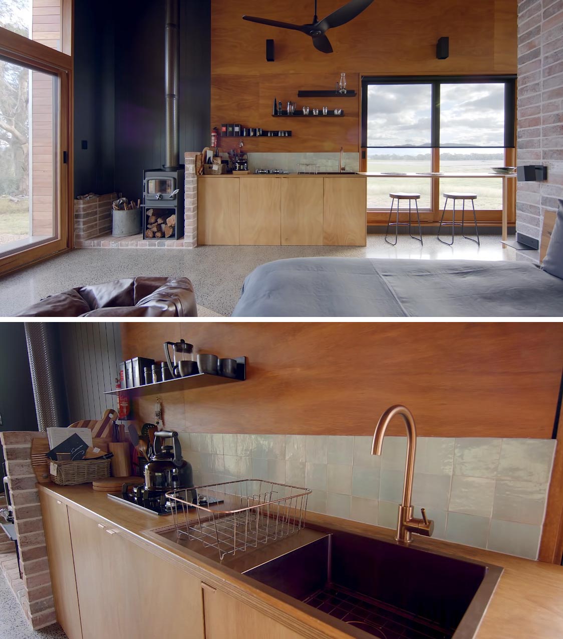 The minimally designed kitchen in this off-grid tiny house includes a wood burning fireplace, a small gas cooktop, sink, small fridge, and floating black shelves.