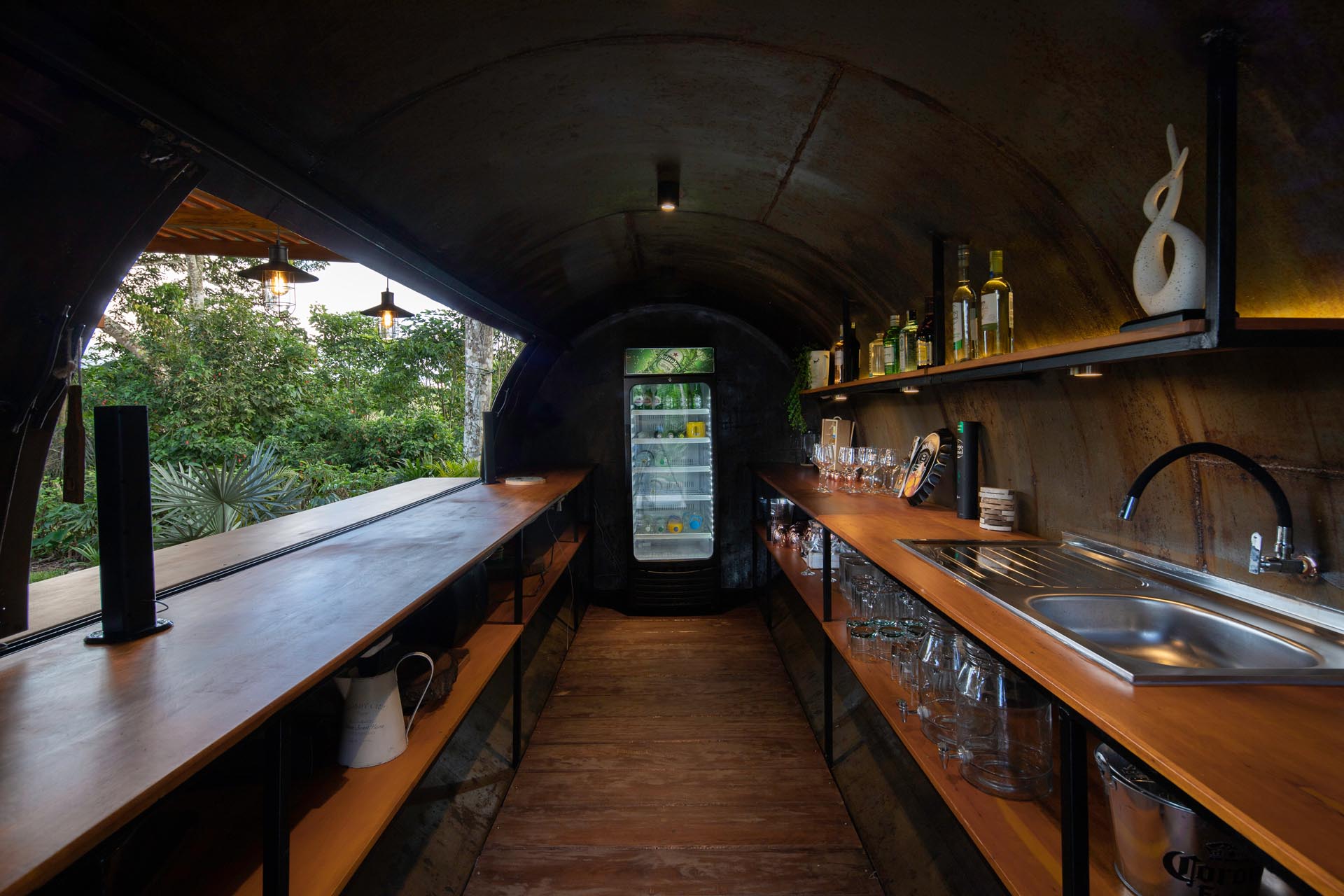 A bar made from a repurposed water tank.