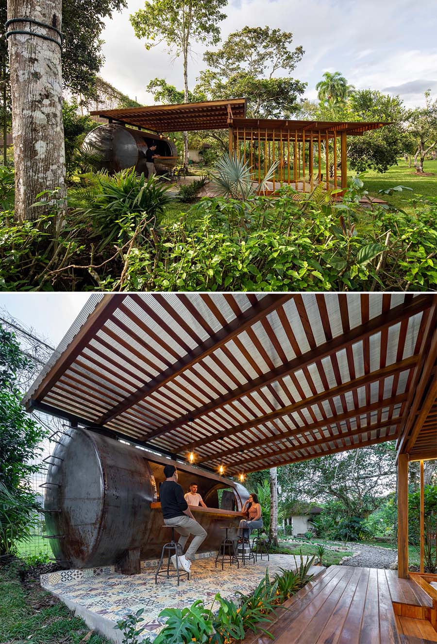 A covered outdoor entertaining space with a bar located within a repurposed water tank, and a sunken conversation pit.