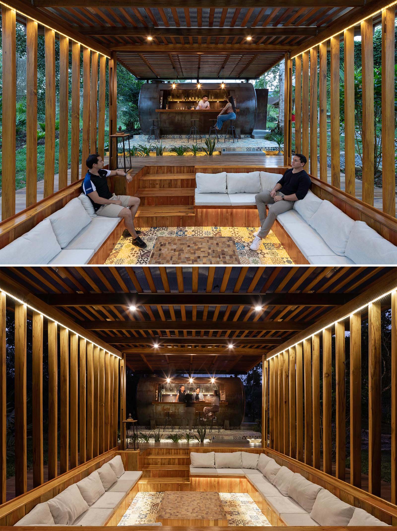 A covered outdoor entertaining space with a bar located within a repurposed water tank, and a sunken conversation pit.