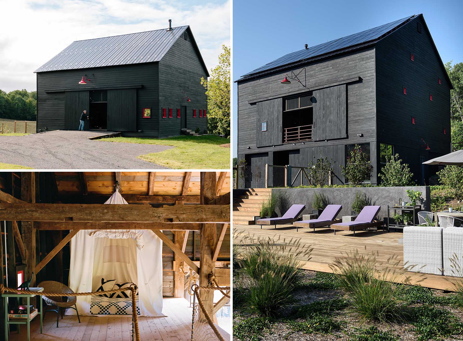 A renovated barn with black exterior and solar panels.