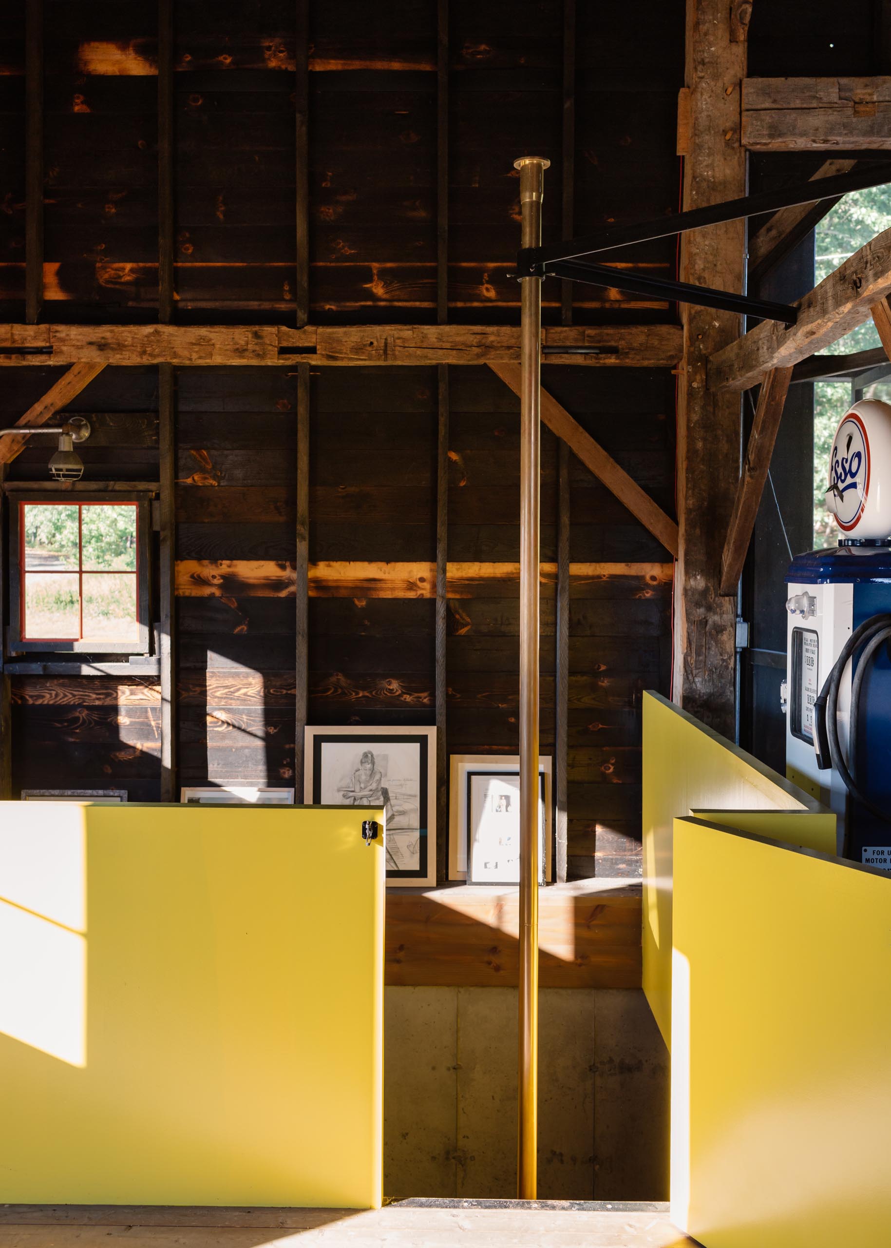 A renovated barn with a fireman's pole.