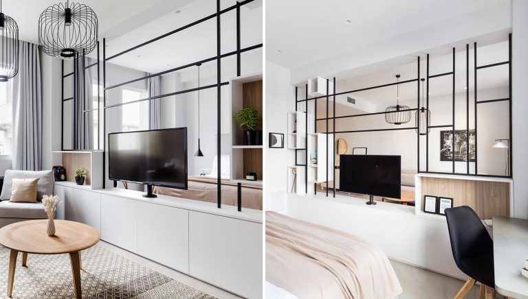 This Black Framed Room Divider Allows The TV To Be Used From Both Sides