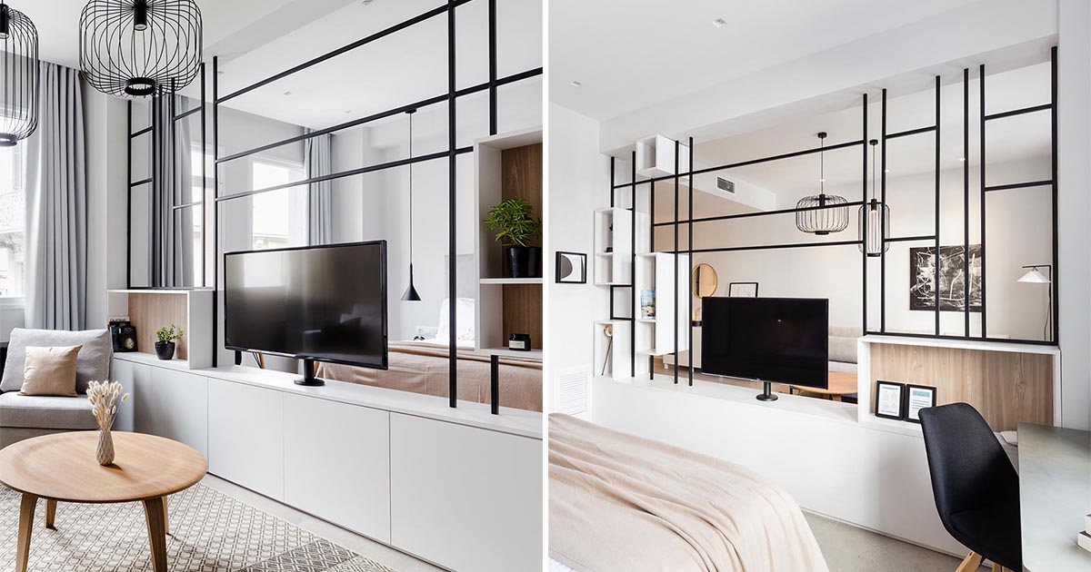 This Black Framed Room Divider Allows The TV To Be Used From Both Sides