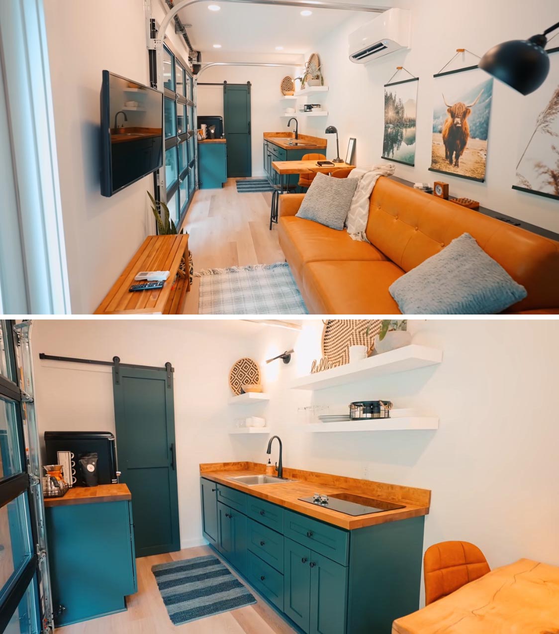 In this modern shipping container home, a small wood table separates the living room from the kitchen, that showcases teal blue cabinets, wood countertops, and white floating shelves that appear to blend into the wall.