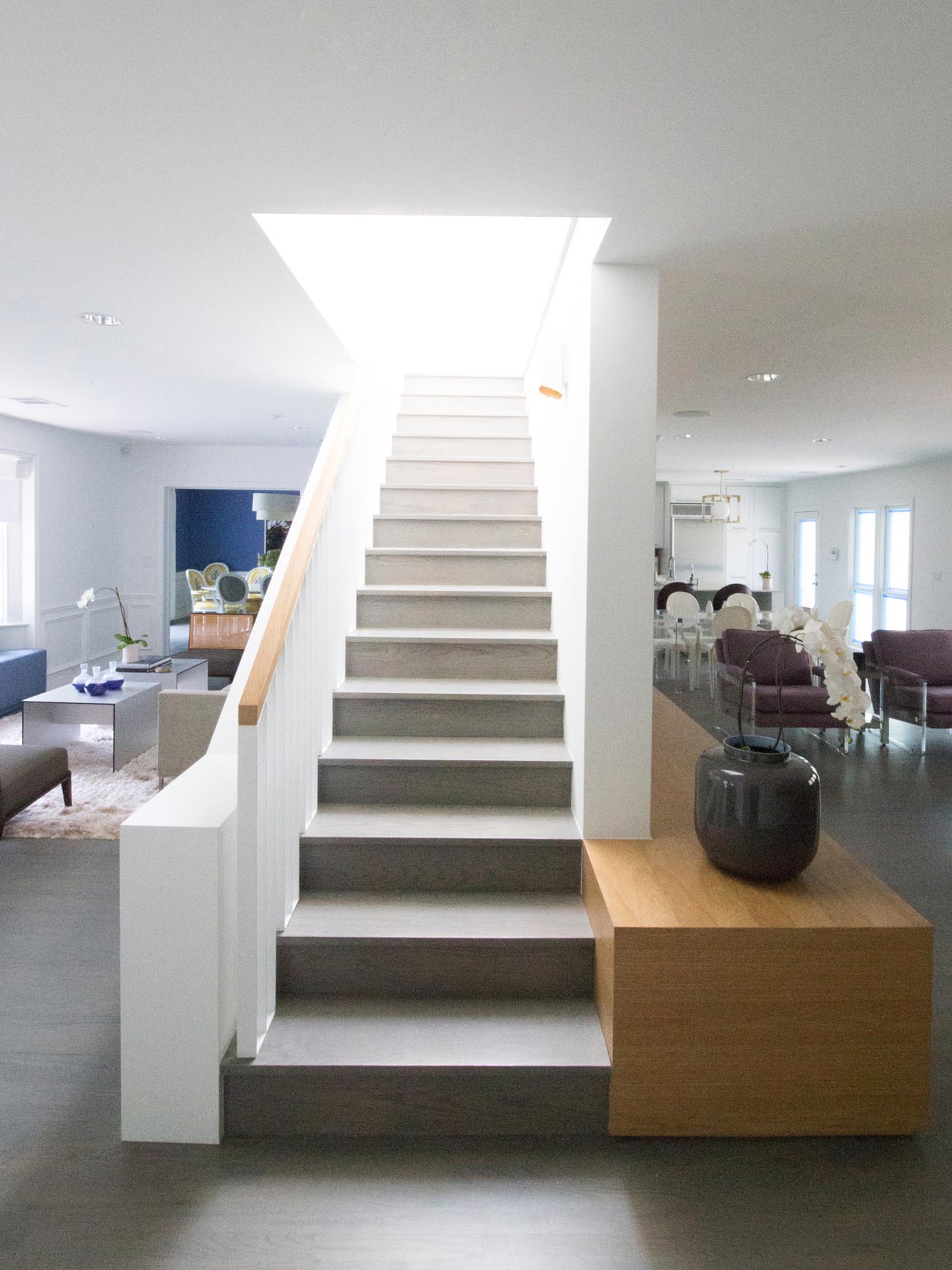 Centrally located stairs that separate different living areas.