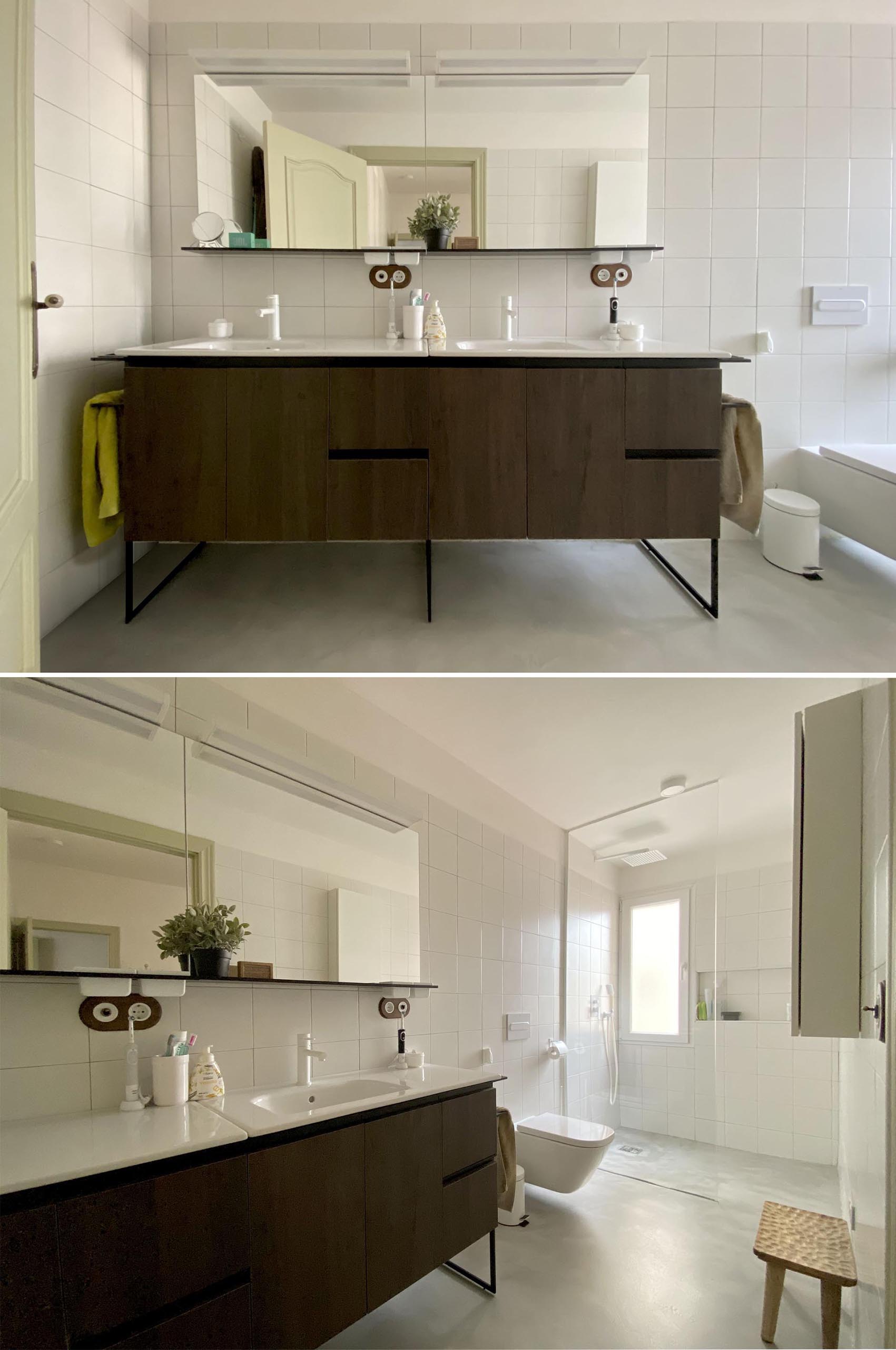 In the bathroom, a dark wood vanity is topped with dual sinks, while square white tiles cover the walls and shower.