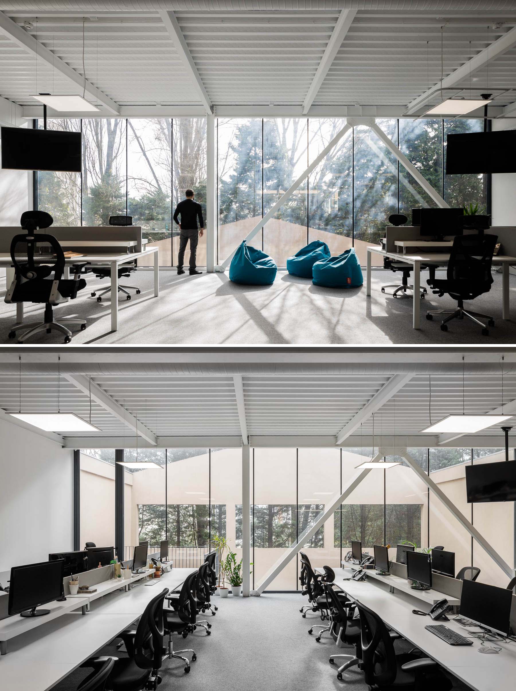 A modern office with floor-to-ceiling windows.