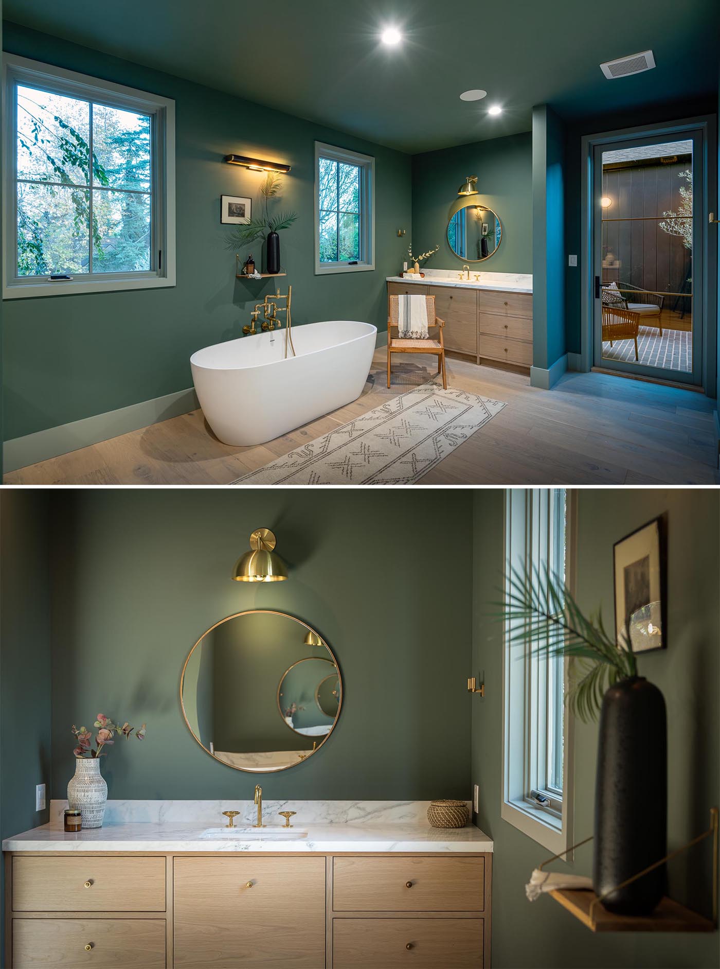 This modern bathroom showcases Elan Vital exposed aged brass plumbing, a freestanding bathtub, and honed marble counters topping the wood vanities.