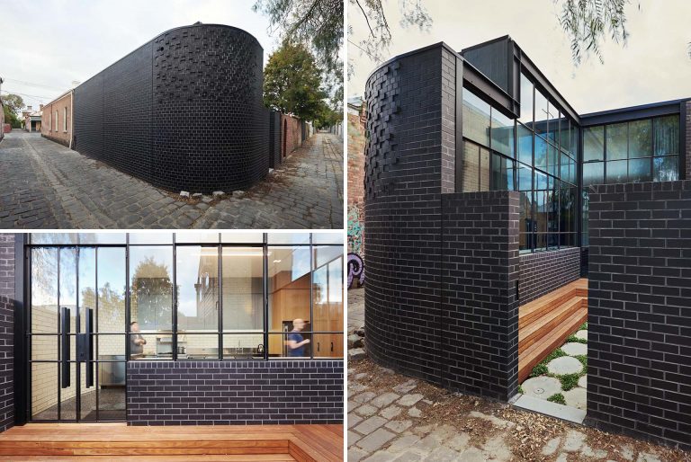 Black Brick Walls Wrap Around The New Addition To This Home