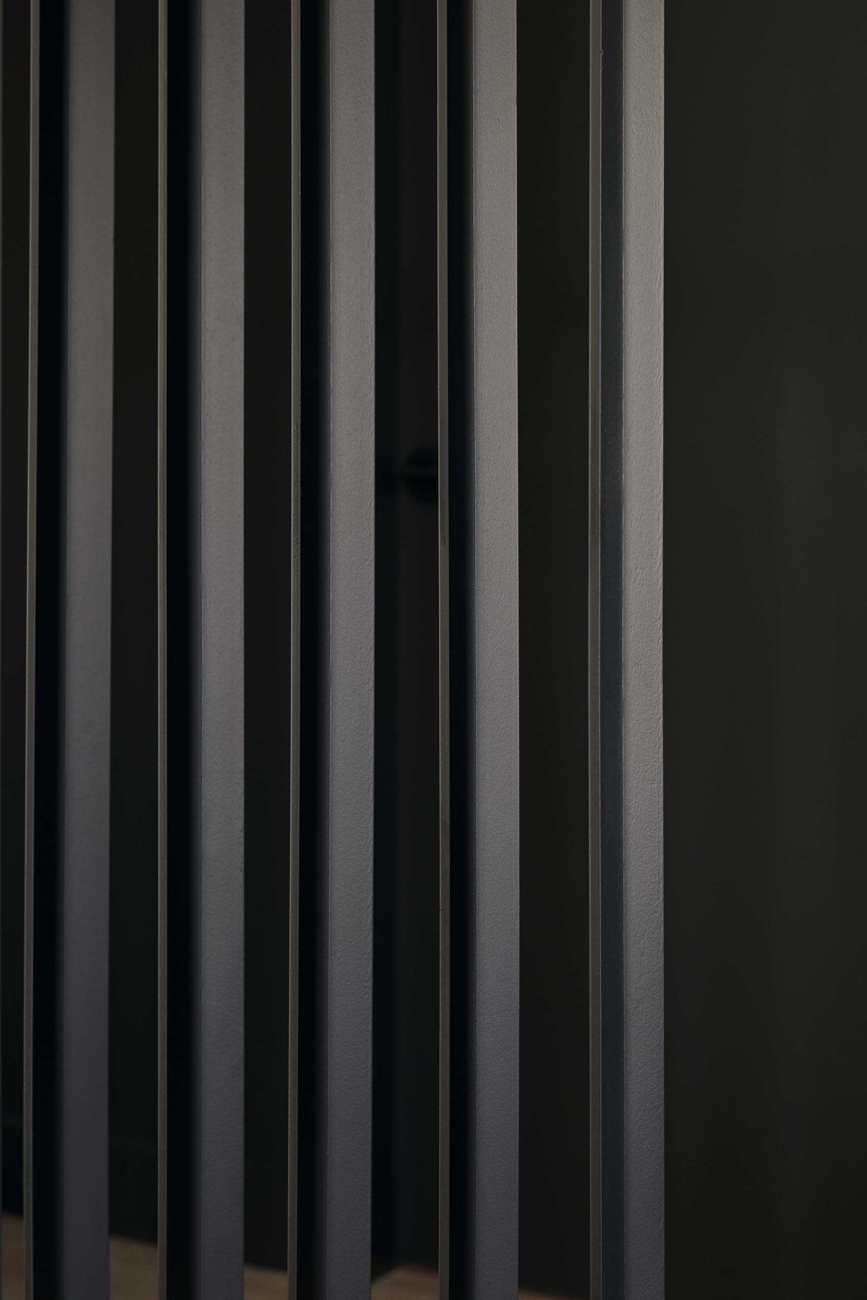 A closeup view of a room divider.