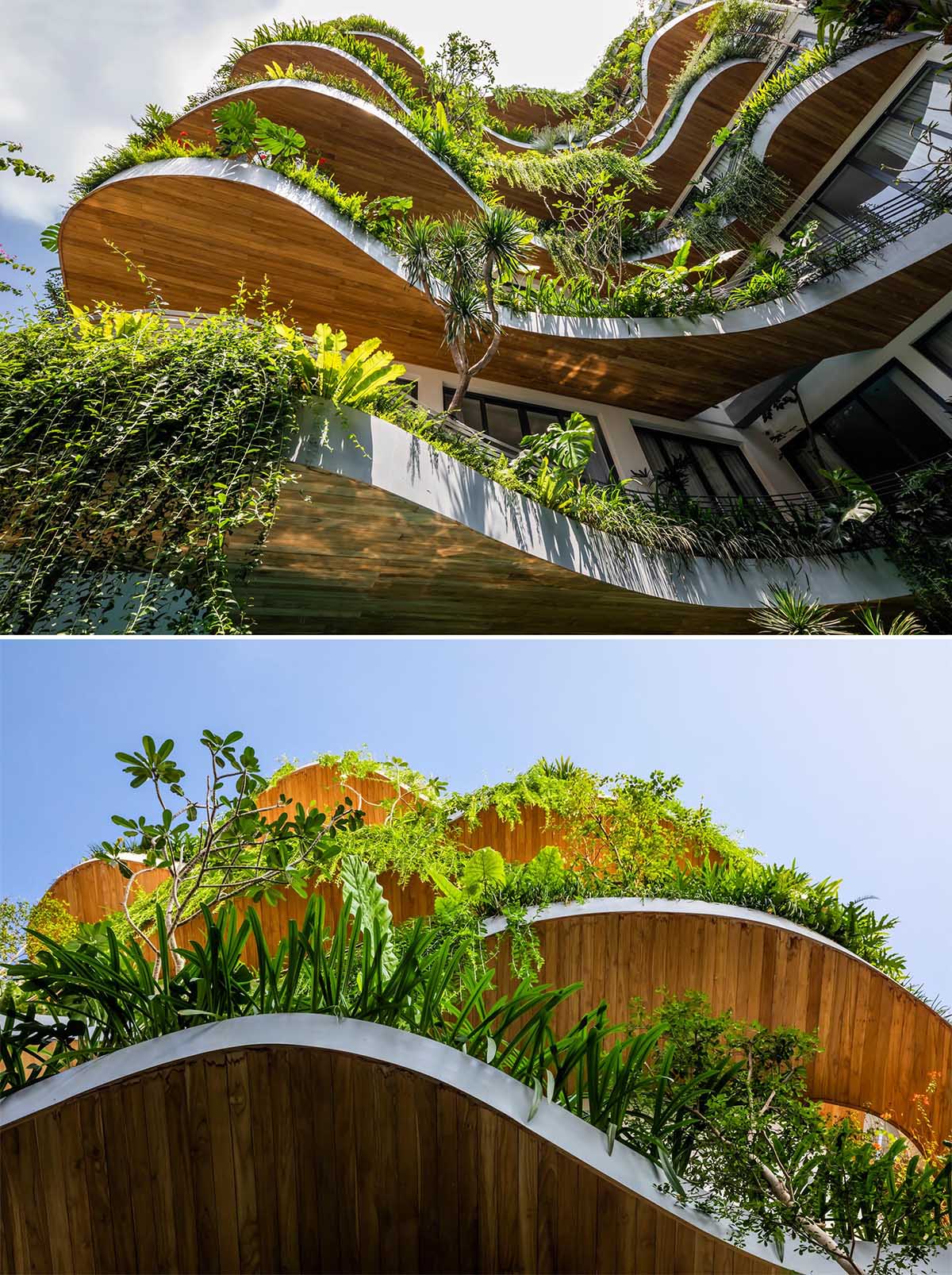 The underside of these balconies is lined with wood, adding to the natural look of the building.