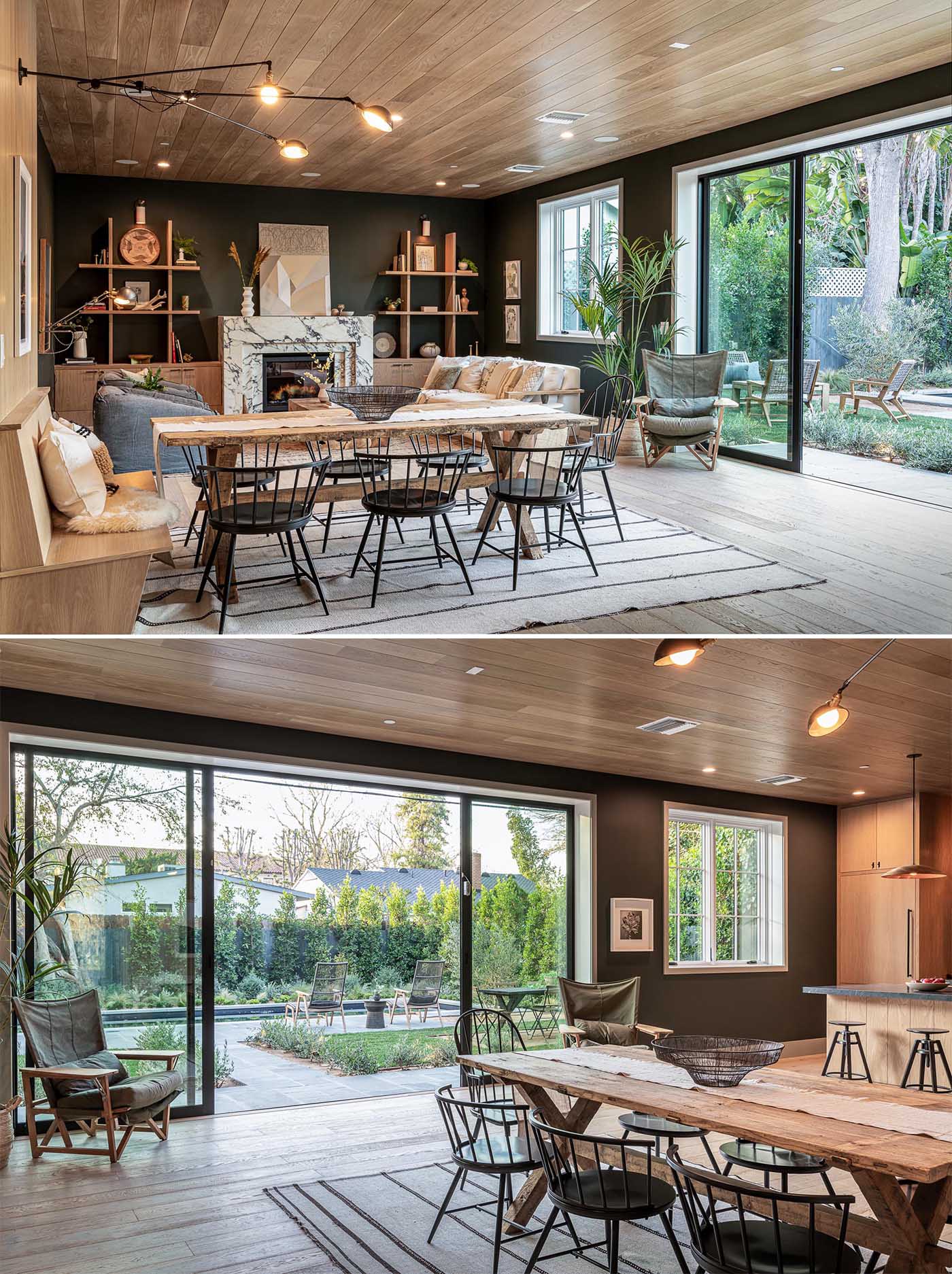 This dining area, with a wood bench at one end, separates the living room from the kitchen. Large sliding glass doors open the interior space to the yard.