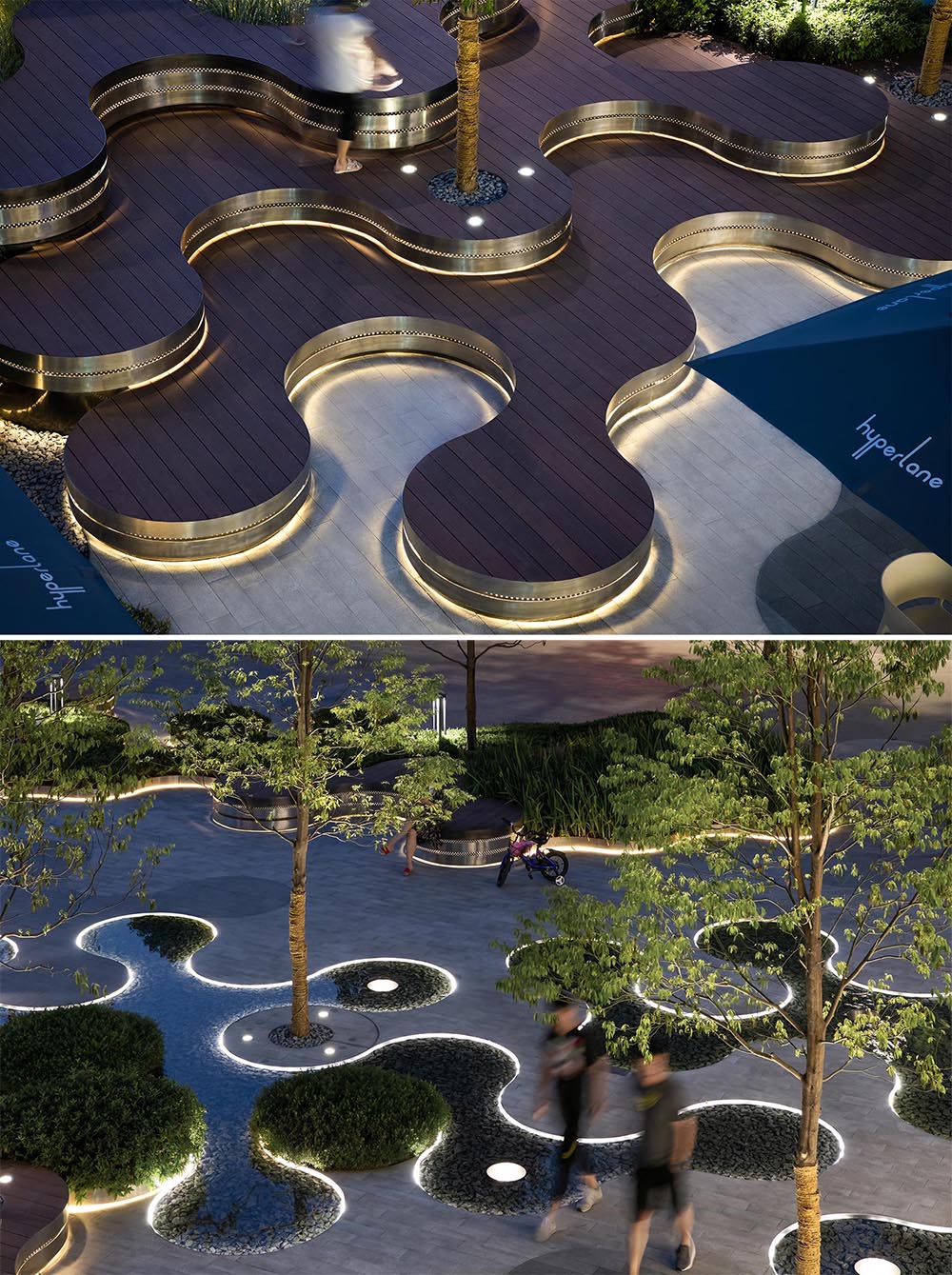 A landscaped park that includes curved tiered seating, water features, a vertical white strip fence, and outdoor lighting.