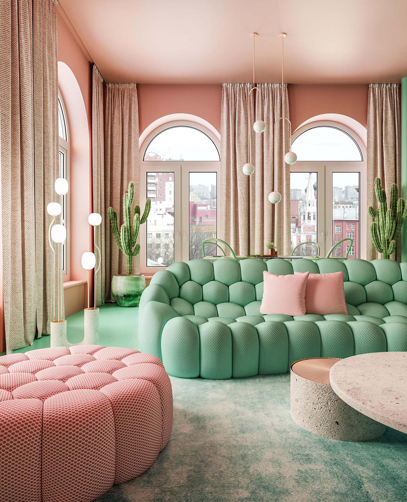 A pink and green living room with floor-to-ceiling curtains and an open floor plan.