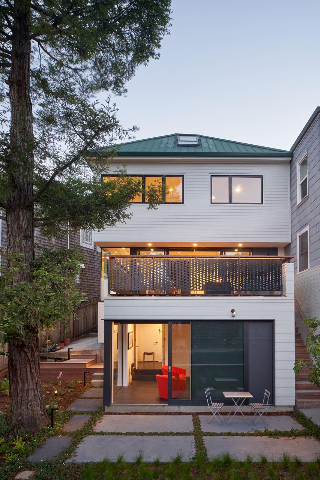 A remodeled home with a new rear deck.