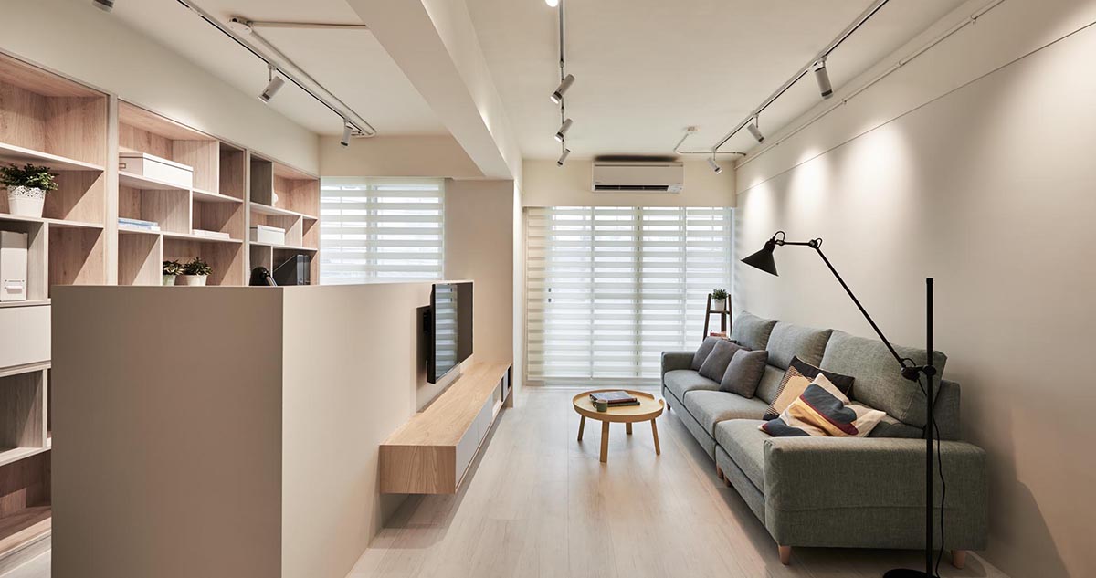 A Partition In The Living Room Creates Space For A Home Office In This Apartment