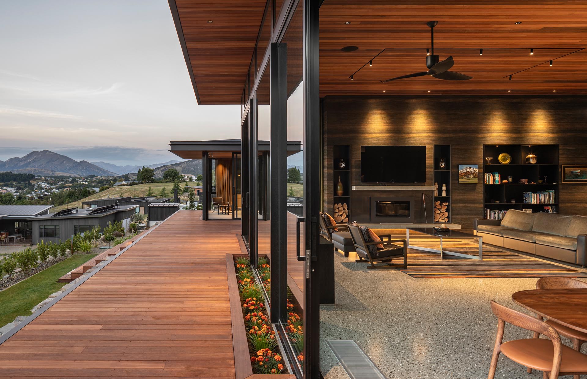 A deck with steps that lead down to the yard also connect with the interior spaces as well as a courtyard.