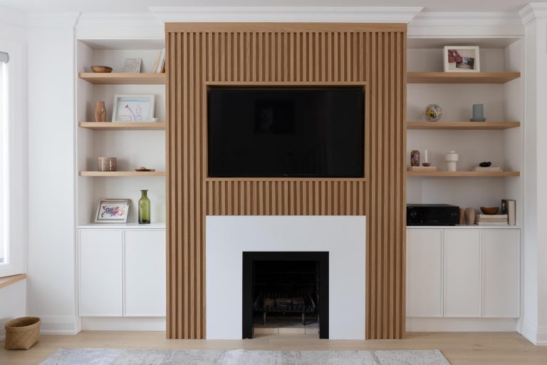 The Wood Slat Accent Of This Living Room Wall Is Perfectly Designed To Surround The TV And Fireplace