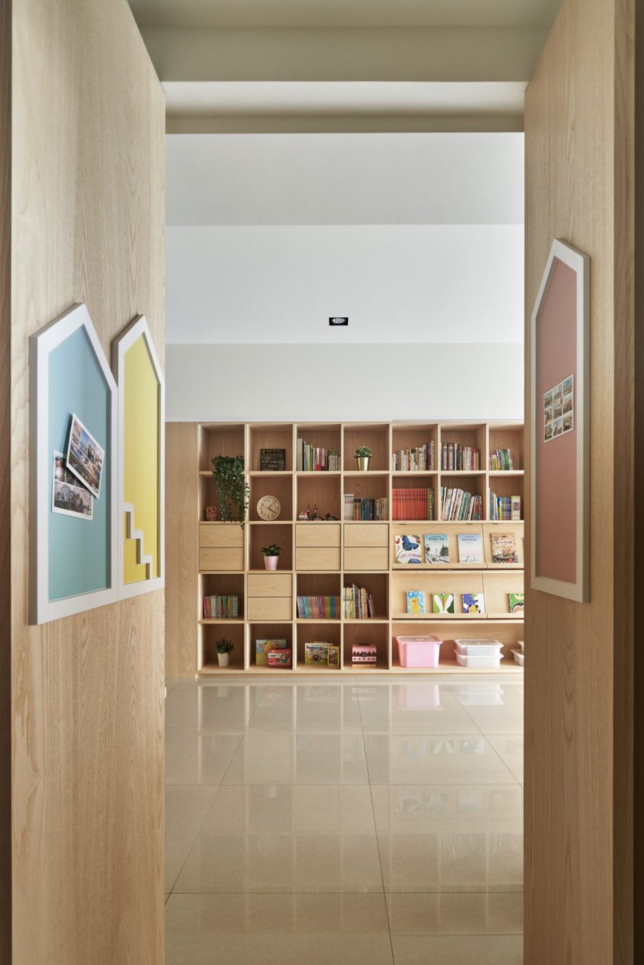 A Sliding Whiteboard Is A Key Feature Of This Shelving Unit Designed