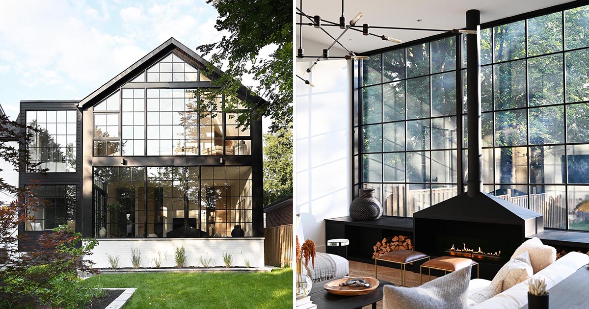 A Grid Of Square Black Window Frames Cover The Back Wall Of This Renovated House