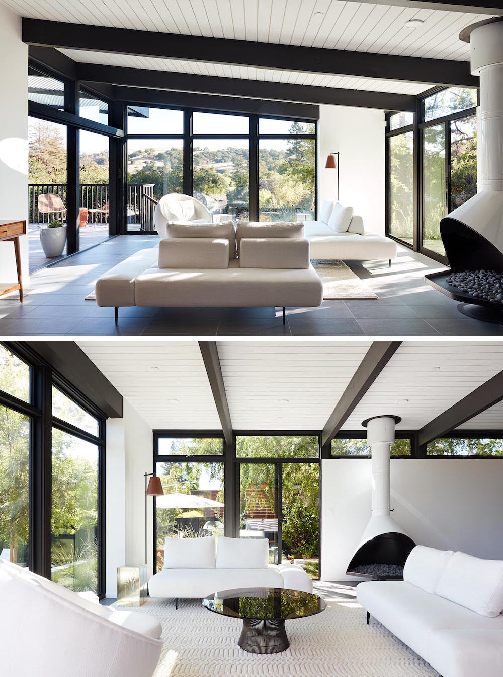 A remodeled living room with a Malm fireplace, black accents, and white walls.