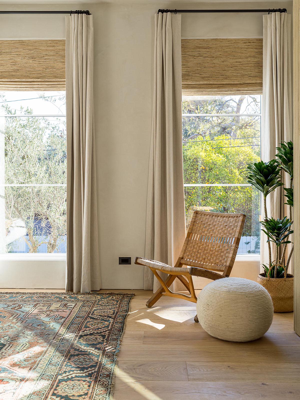 A contemporary bedroom with an earthy color palette.