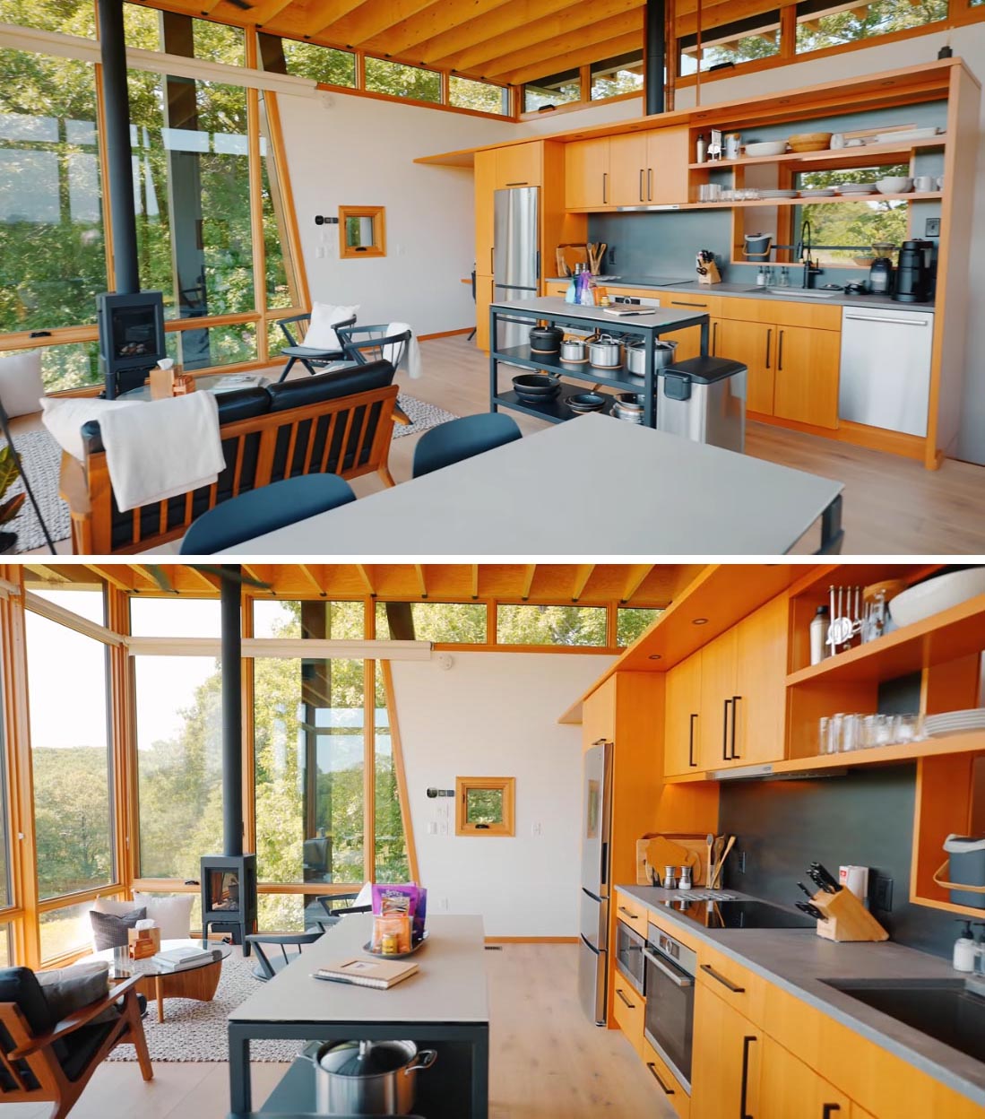 The upper level of this modern cabin is home to an open plan glass-walled living room, dining area, and small kitchen.