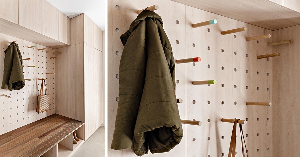 A Combined Mudroom And Laundry Room With A Pegboard Wall Is A New Addition To This Remodeled Home