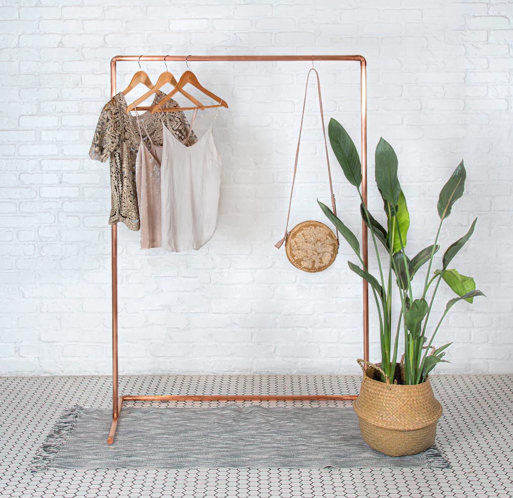 Storage Idea - Modern freestanding copper clothes rack.