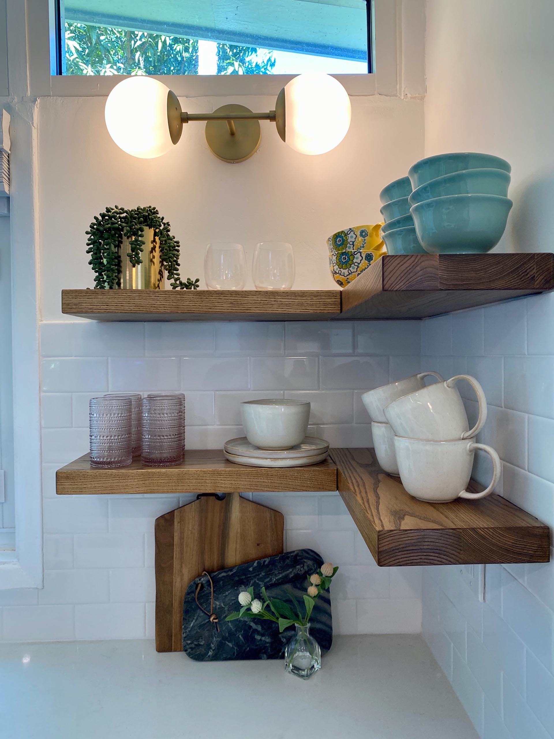 Floating wood shelving for the corner.