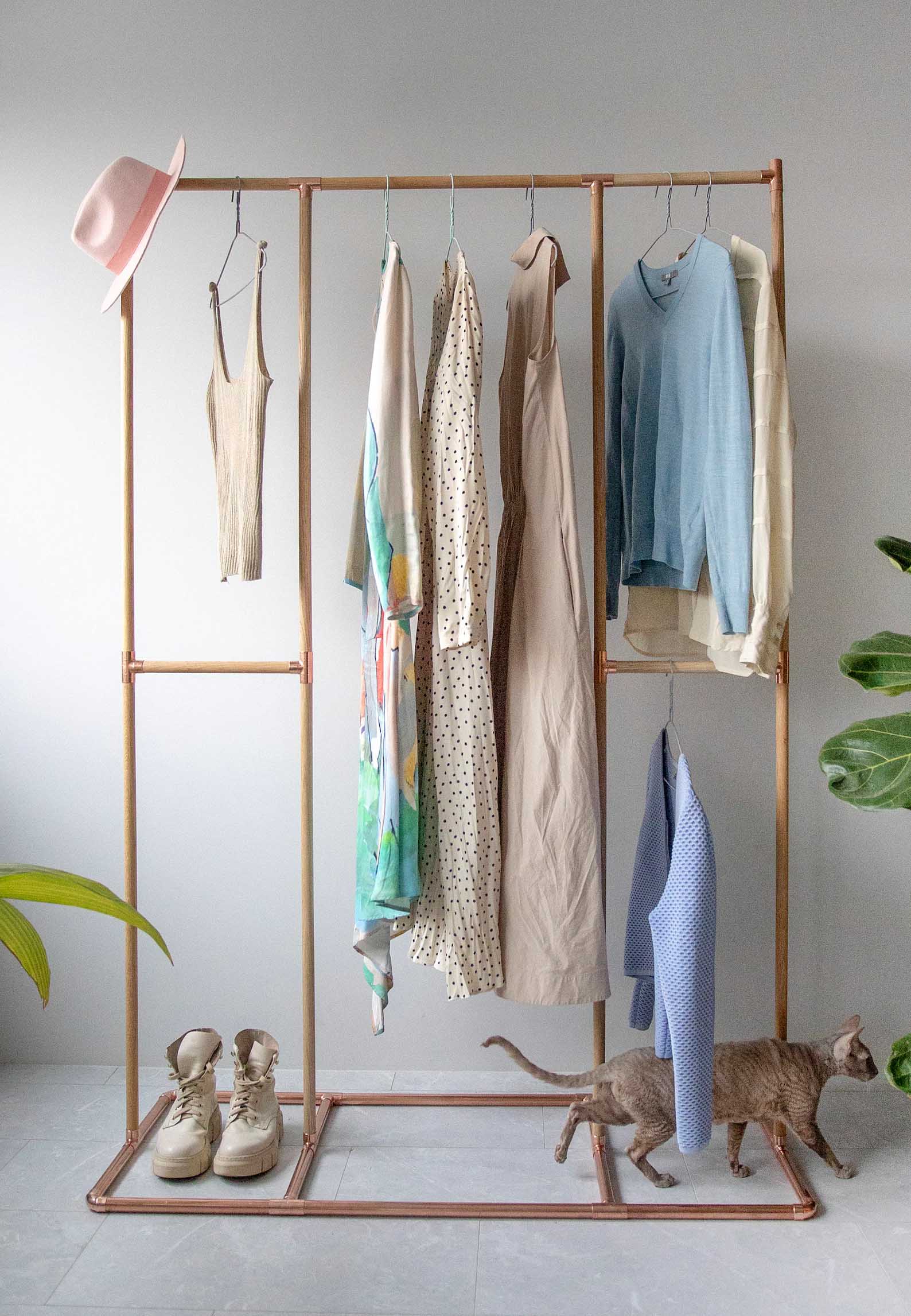 Storage Idea - Modern freestanding wood and copper clothes rack.